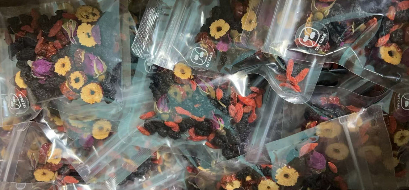 Sealed sachets of Bare — black tea, goji berries and rose petals